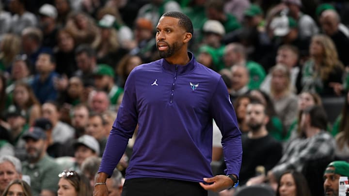 Apr 11, 2025; Boston, Massachusetts, USA; Charlotte Hornets head coach Charles Lee reacts to game action during the first half against the Boston Celtics at TD Garden. Mandatory Credit: Eric Canha-Imagn Images