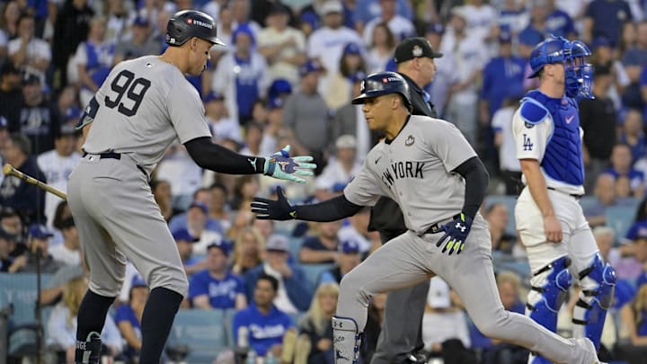 Oct 26, 2024; Los Angeles, California, USA; New York Yankees outfielder Juan Soto (22) celebrates with outfielder Aaron Judge (99) after hitting a solo home run in the third inning against the Los Angeles Dodgers during game two of the 2024 MLB World Series at Dodger Stadium. Mandatory Credit: Jayne Kamin-Oncea-Imagn Images Oct 26, 2024; Los Angeles, California, USA; New York Yankees outfielder Juan Soto (22) celebrates with outfielder Aaron Judge (99) after hitting a solo home run in the third inning against the Los Angeles Dodgers during game two of the 2024 MLB World Series at Dodger Stadium. Mandatory Credit: Jayne Kamin-Oncea-Imagn Images