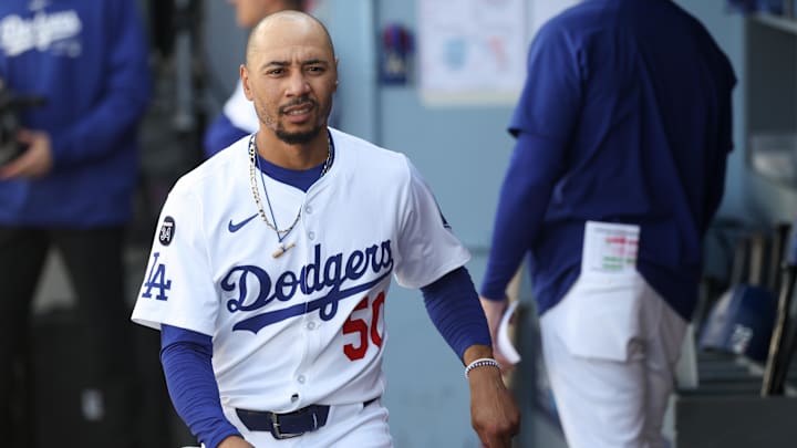 Apr 13, 2025; Los Angeles, California, USA; Los Angeles Dodgers shortstop Mookie Betts (50) looks on before the game against the Chicago Cubs at Dodger Stadium. Mandatory Credit: Kiyoshi Mio-Imagn Images Apr 13, 2025; Los Angeles, California, USA; Los Angeles Dodgers shortstop Mookie Betts (50) looks on before the game against the Chicago Cubs at Dodger Stadium. Mandatory Credit: Kiyoshi Mio-Imagn Images