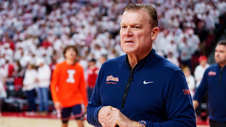Feb 1, 2026; Lincoln, Nebraska, USA; Illinois Fighting Illini head coach Brad Underwood walks onto the court before the game against the Nebraska Cornhuskers at Pinnacle Bank Arena. Mandatory Credit: Dylan Widger-Imagn Images
