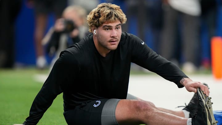 Indianapolis Colts defensive end Laiatu Latu (97) warms up before a game against the Detroit Lions on Sunday, Nov. 24, 2024, at Lucas Oil Stadium in Indianapolis. Indianapolis Colts defensive end Laiatu Latu (97) warms up before a game against the Detroit Lions on Sunday, Nov. 24, 2024, at Lucas Oil Stadium in Indianapolis.