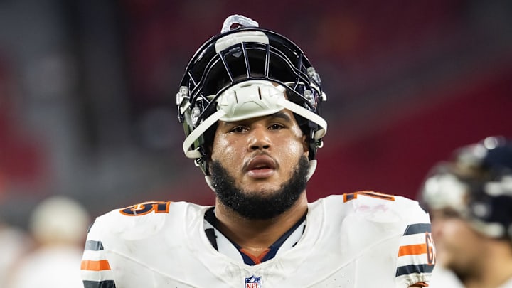 Nov 3, 2024; Glendale, Arizona, USA; Chicago Bears offensive tackle Larry Borom (75) against the Arizona Cardinals at State Farm Stadium. Mandatory Credit: Mark J. Rebilas-Imagn Images