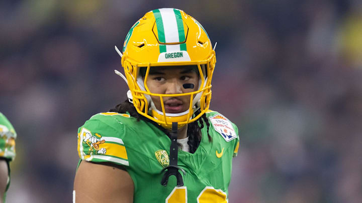 Jan 1, 2024; Glendale, AZ, USA; Oregon Ducks defensive end Matayo Uiagalelei (10) against the Liberty Flames during the 2024 Fiesta Bowl at State Farm Stadium. Mandatory Credit: Mark J. Rebilas-Imagn Images
