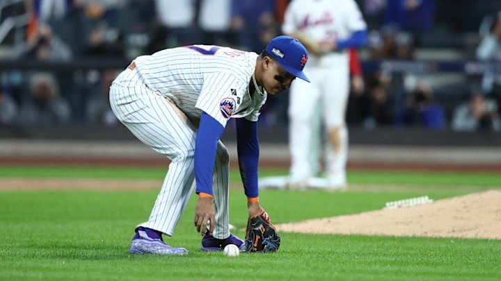 Oct 9, 2024; New York, New York, USA; New York Mets third baseman Mark Vientos (27) reacts after an error allowed a run to score against the Philadelphia Phillies in game four of the NLDS for the 2024 MLB Playoffs at Citi Field. Mandatory Credit: Wendell Cruz-Imagn Images