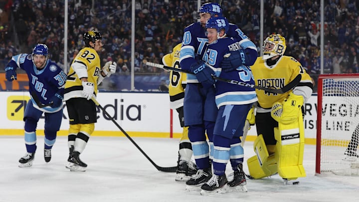 Feb 1, 2026; Tampa Bay, Florida, USA; Tampa Bay Lightning left wing Nick Paul (20) reacts with center Jake Guentzel (59) after scoring a goal against the Boston Bruins during the second period in the 2026 Stadium Series ice hockey game at Raymond James Stadium. Mandatory Credit: Kim Klement Neitzel-Imagn Images