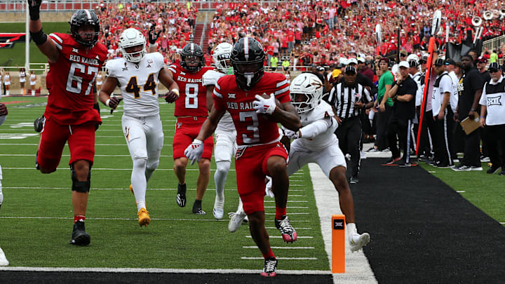 Texas Tech Red Raiders wide receiver Josh Kelly scores a touchdown against Arizona State Sun Devils safety Myles Rowser. Texas Tech Red Raiders wide receiver Josh Kelly scores a touchdown against Arizona State Sun Devils safety Myles Rowser.