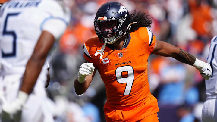 Sep 7, 2025; Denver, Colorado, USA; Denver Broncos safety Talanoa Hufanga (9) reacts against the Tennessee Titans in the first half at Empower Field at Mile High. Sep 7, 2025; Denver, Colorado, USA; Denver Broncos safety Talanoa Hufanga (9) reacts against the Tennessee Titans in the first half at Empower Field at Mile High.