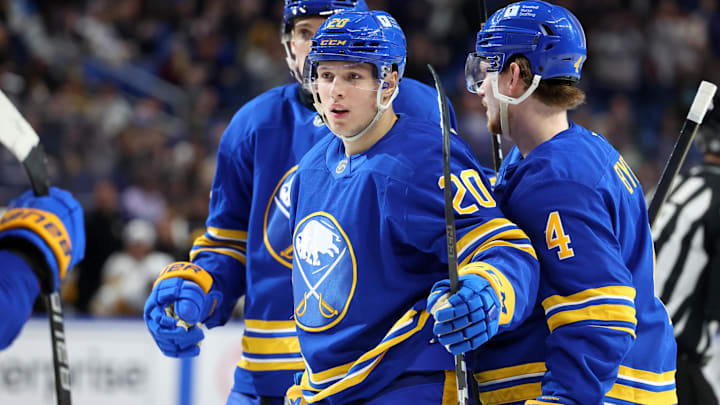 Mar 27, 2025; Buffalo, New York, USA;  Buffalo Sabres center Jiri Kulich (20) celebrates his goal with teammates during the second period against the Pittsburgh Penguins at KeyBank Center. Mandatory Credit: Timothy T. Ludwig-Imagn Images