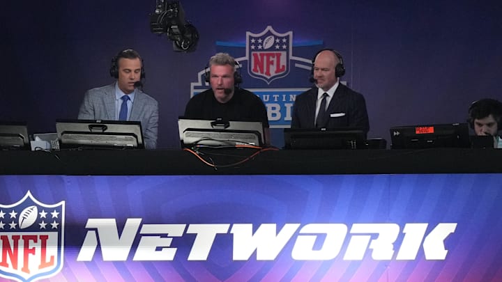 Mar 2, 2024; Indianapolis, IN, USA; NFL Network hosts Daniel Jeremiah (left), Pat McAfee (center)