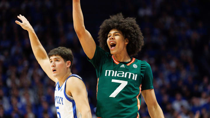 Nov 28, 2023; Lexington, Kentucky, USA; Miami (Fl) Hurricanes guard Kyshawn George (7) reacts after making a basket during the first half against the Kentucky Wildcats at Rupp Arena at Central Bank Center. Mandatory Credit: Jordan Prather-USA TODAY Sports