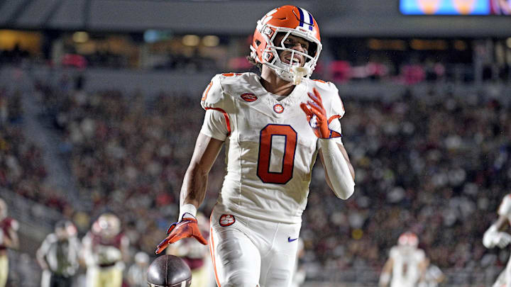 Oct 5, 2024; Tallahassee, Florida, USA; Clemson Tigers wide receiver Antonio Williams (0) scores a touchdown against the Florida State Seminoles during the first half at Doak S. Campbell Stadium. Mandatory Credit: Melina Myers-Imagn Images