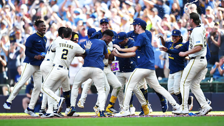 Jul 9, 2025; Milwaukee, Wisconsin, USA; The Milwaukee Brewers celebrate a walk-off single by center fielder Jackson Chourio during the tenth inning against the Los Angeles Dodgers at American Family Field. Mandatory Credit: Patrick Gorski-Imagn Images Jul 9, 2025; Milwaukee, Wisconsin, USA; The Milwaukee Brewers celebrate a walk-off single by center fielder Jackson Chourio during the tenth inning against the Los Angeles Dodgers at American Family Field. Mandatory Credit: Patrick Gorski-Imagn Images