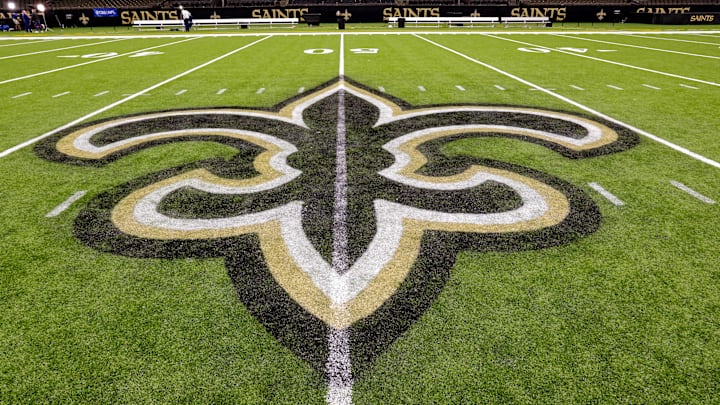 Oct 30, 2022; New Orleans, Louisiana, USA;  General view of the New Orleans Saints logo as the midfield logo fleur-de-lis after the game between the New Orleans Saints and the Las Vegas Raiders at Caesars Superdome. Mandatory Credit: Stephen Lew-Imagn Images