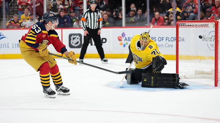 Feb 4, 2026; Sunrise, Florida, USA; Florida Panthers left wing Brad Marchand (63) scores the winning goal against Boston Bruins goaltender Joonas Korpisalo (70) during a shootout at Amerant Bank Arena. Mandatory Credit: Sam Navarro-Imagn Images