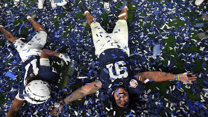 Penn State Nittany Lions defensive end Dvon J-Thomas celebrates after their 31-14 win over the Boise State Broncos in the Vrbo Fiesta Bowl at State Farm Stadium on Dec. 31, 2024.