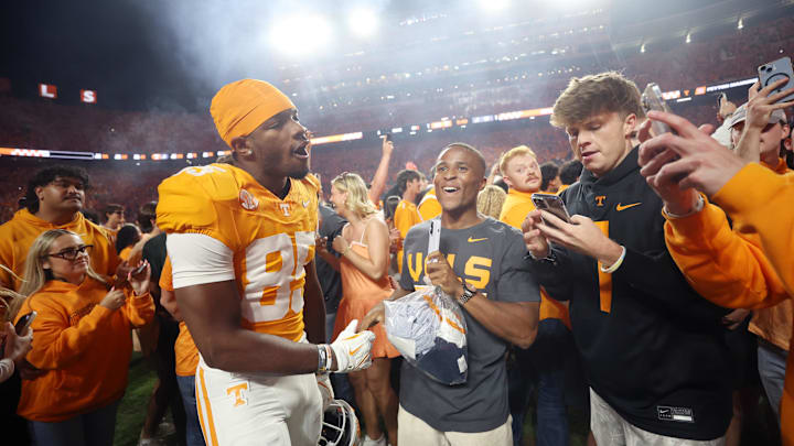 Oct 19, 2024; Knoxville, Tennessee, USA; Tennessee Volunteers wide receiver Nathan Leacock (85) celebrates with fans after defeating the Alabama Crimson Tide at Neyland Stadium. Mandatory Credit: Alan Poizner-Imagn Images