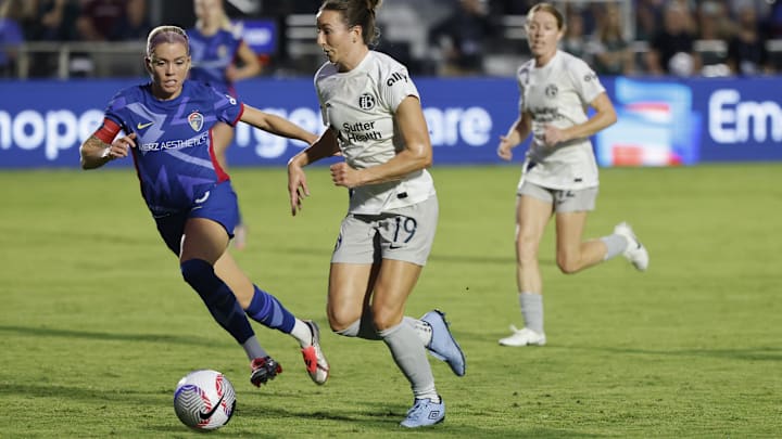 Bay FC midfielder Dorian Bailey (19) dribbles the ball against North Carolina Courage during the first half at WakeMed Soccer Park 