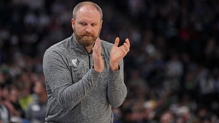 Jan 18, 2024; Minneapolis, Minnesota, USA; Memphis Grizzlies head coach Taylor Jenkins applauds