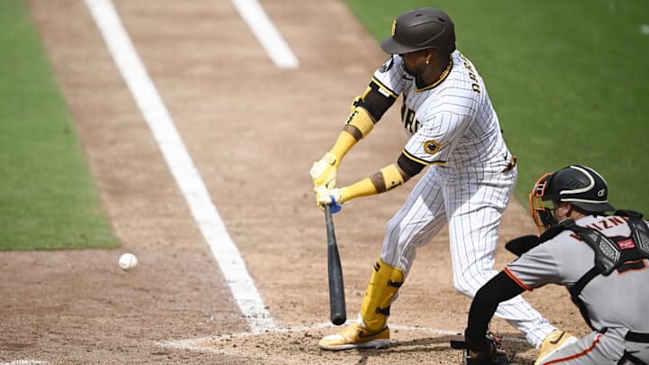 Aug 21, 2025; San Diego, California, USA; San Diego Padres first baseman Luis Arraez (4) hits a single during the sixth inning against the San Francisco Giants at Petco Park. Mandatory Credit: Denis Poroy-Imagn Images Aug 21, 2025; San Diego, California, USA; San Diego Padres first baseman Luis Arraez (4) hits a single during the sixth inning against the San Francisco Giants at Petco Park. Mandatory Credit: Denis Poroy-Imagn Images