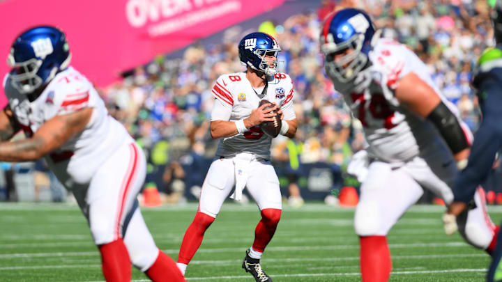 Oct 6, 2024; Seattle, Washington, USA; New York Giants quarterback Daniel Jones (8) looks to pass the ball against the Seattle Seahawks during the first half at Lumen Field. Oct 6, 2024; Seattle, Washington, USA; New York Giants quarterback Daniel Jones (8) looks to pass the ball against the Seattle Seahawks during the first half at Lumen Field.