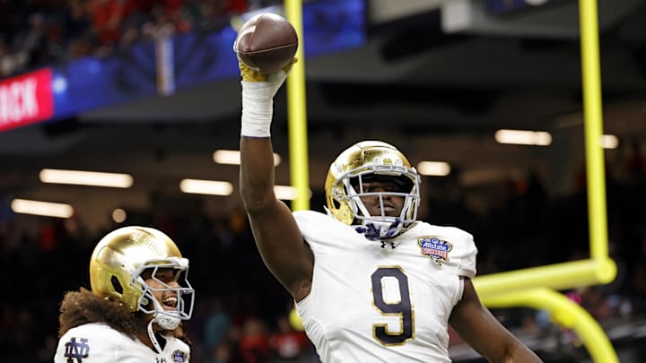 Jan 2, 2025; New Orleans, LA, USA; Notre Dame Fighting Irish defensive lineman RJ Oben (9) celebrates after scoring a touch down during the second quarter against Georgia Bulldogs during the first half at Caesars Superdome. 