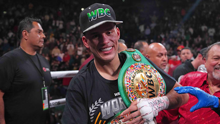 David Benavidez celebrates after defeating Caleb Plant (not pictured) in their Interim WBC Super Middleweight Championship boxing bout at MGM Grand Garden Arena. 