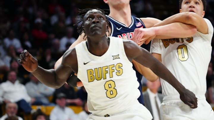 Mar 7, 2026; Boulder, Colorado, USA; Colorado Buffaloes forward Bangot Dak (8) blocks out in the first half against the Arizona Wildcats at the CU Events Center. Mandatory Credit: Ron Chenoy-Imagn Images