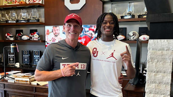 Oklahoma coach Brent Venables, commit Mikhail McCreary Oklahoma coach Brent Venables, commit Mikhail McCreary
