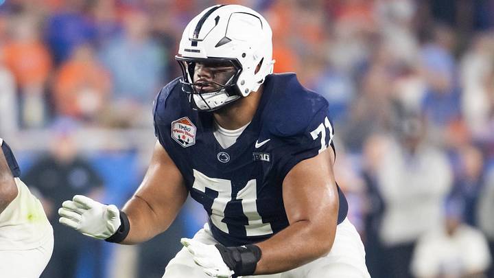 Dec 31, 2024; Glendale, AZ, USA; Penn State Nittany Lions offensive lineman Olaivavega Ioane (71) against the Boise State Broncos during the Fiesta Bowl at State Farm Stadium. Mandatory Credit: Mark J. Rebilas-Imagn Images Dec 31, 2024; Glendale, AZ, USA; Penn State Nittany Lions offensive lineman Olaivavega Ioane (71) against the Boise State Broncos during the Fiesta Bowl at State Farm Stadium. Mandatory Credit: Mark J. Rebilas-Imagn Images