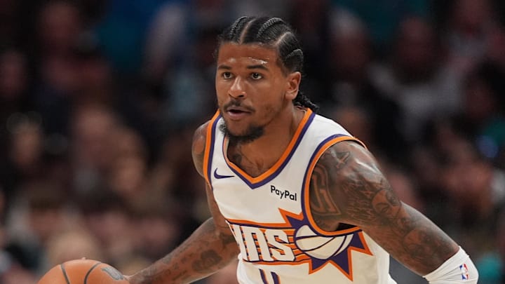 Phoenix Suns guard Jalen Green brings the ball up court against the Charlotte Hornets during the first quarter at Spectrum Center.
