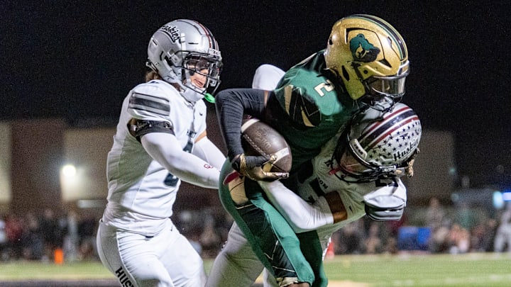 Hamilton's Keaton Fields (23) tackles Basha's Jaden Baldwin (2) during their matchup last week. Hamilton's Keaton Fields (23) tackles Basha's Jaden Baldwin (2) during their matchup last week.
