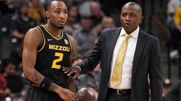 Mar 2, 2024; Columbia, Missouri, USA; Missouri Tigers head coach Dennis Gates talks with guard Tamar Bates (2) against the Mississippi Rebels during the first half at Mizzou Arena. Mandatory Credit: Denny Medley-Imagn Images