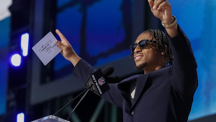 Apr 25, 2025; Green Bay, WI, USA; Indianapolis Colts running back Jonathan Taylor gestures to the crowd after announcing the team’s selection with the 45th overall pick during the 2025 NFL Draft at Lambeau Field. Mandatory Credit: Tork Mason/USA Today Network via Imagn Images