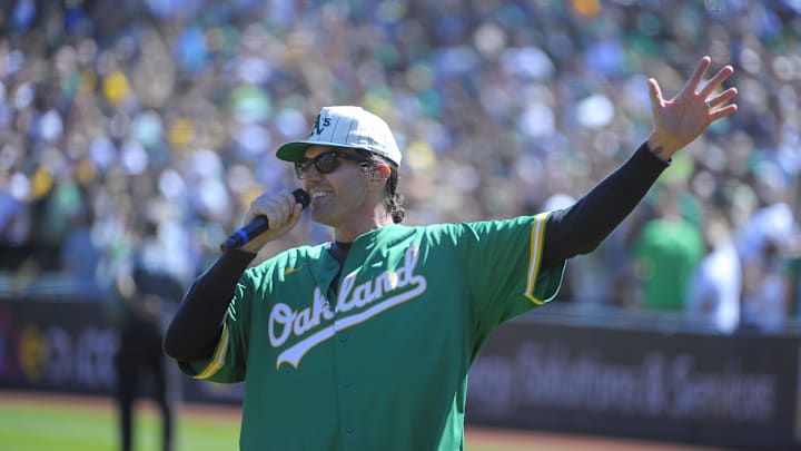 Sep 26, 2024; Oakland, California, USA; Oakland Athletics former pitcher Barry Zito sings the National Anthem before the game against the Texas Rangers at Oakland-Alameda County Coliseum. 