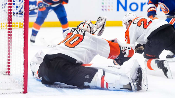 Apr 3, 2026; Elmont, New York, USA; Philadelphia Flyers goaltender Dan Vladar (80) makes a save against the New York Islanders in the second period at UBS Arena. Apr 3, 2026; Elmont, New York, USA; Philadelphia Flyers goaltender Dan Vladar (80) makes a save against the New York Islanders in the second period at UBS Arena.