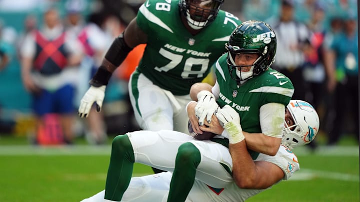Miami Dolphins defensive tackle Zach Sieler (92) sacks New York Jets quarterback Zach Wilson (2) during the first half at Hard Rock Stadium. Miami Dolphins defensive tackle Zach Sieler (92) sacks New York Jets quarterback Zach Wilson (2) during the first half at Hard Rock Stadium.