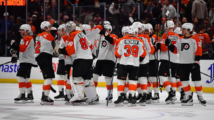 Mar 18, 2026; Anaheim, California, USA; Philadelphia Flyers celebrate the goal scored by left wing Noah Cates (27) against the Anaheim Ducks for the overtime victory at Honda Center. Mar 18, 2026; Anaheim, California, USA; Philadelphia Flyers celebrate the goal scored by left wing Noah Cates (27) against the Anaheim Ducks for the overtime victory at Honda Center.
