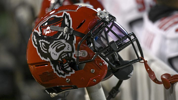 Nov 13, 2021; Winston-Salem, North Carolina, USA; A North Carolina State Wolfpack helmet seen on the sideline during the second half against the Wake Forest Demon Deacons at Truist Field. Mandatory Credit: William Howard-Imagn Images