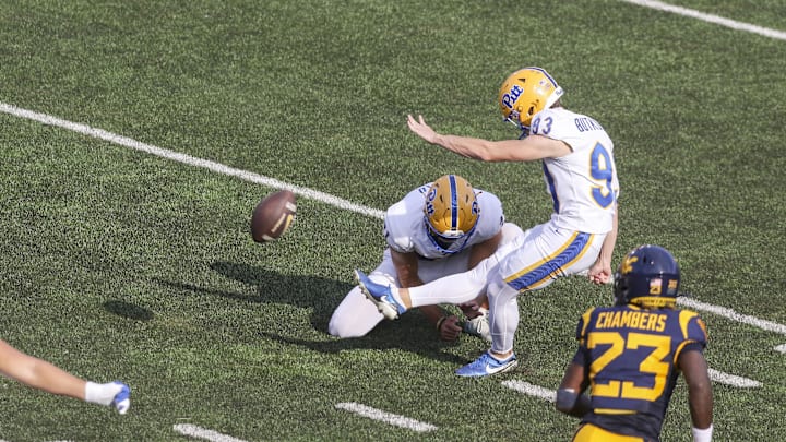 Sep 13, 2025; Morgantown, West Virginia, USA; Pittsburgh Panthers place kicker Trey Butkowski (93) kicks a field goal during the second quarter against the West Virginia Mountaineers at Milan Puskar Stadium. Mandatory Credit: Ben Queen-Imagn Images Sep 13, 2025; Morgantown, West Virginia, USA; Pittsburgh Panthers place kicker Trey Butkowski (93) kicks a field goal during the second quarter against the West Virginia Mountaineers at Milan Puskar Stadium. Mandatory Credit: Ben Queen-Imagn Images