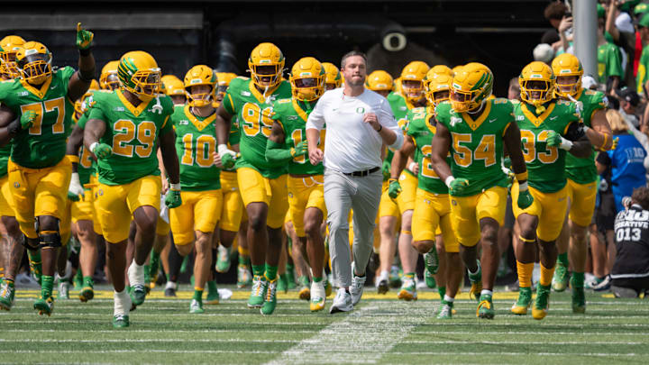 Oregon head coach Dan Lanning leads his team onto the field as the Oregon Ducks host the Montana State Bobcats on Aug. 30, 2025, at Autzen Stadium in Eugene, Oregon.