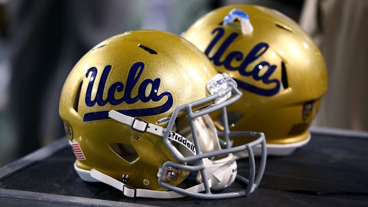Sep 25, 2014; Tempe, AZ, USA; Detailed view of UCLA Bruins helmets on the sidelines against the Arizona State Sun Devils at Sun Devil Stadium. Mandatory Credit: Mark J. Rebilas-Imagn Images