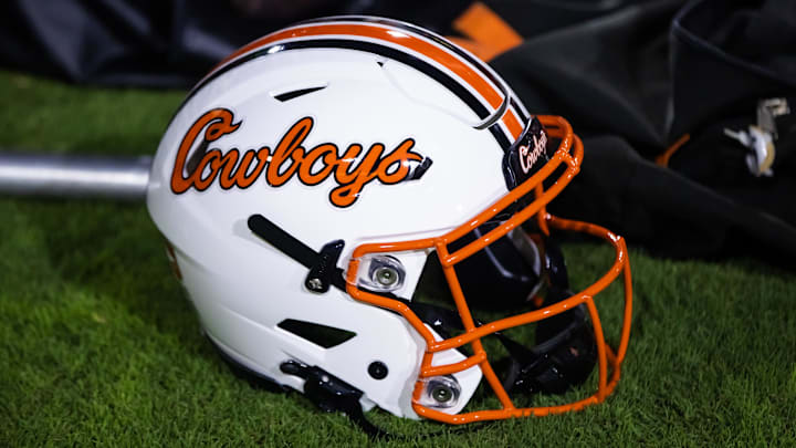 Sep 9, 2023; Tempe, Arizona, USA; Detailed view of an Oklahoma State Cowboys helmet at Mountain America Stadium. Mandatory Credit: Mark J. Rebilas-Imagn Images Sep 9, 2023; Tempe, Arizona, USA; Detailed view of an Oklahoma State Cowboys helmet at Mountain America Stadium. Mandatory Credit: Mark J. Rebilas-Imagn Images
