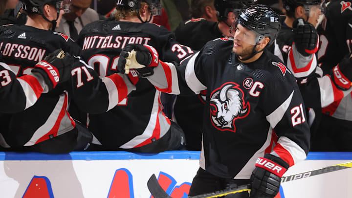 Dec 9, 2023; Buffalo, New York, USA;  Buffalo Sabres right wing Kyle Okposo (21) celebrates his goal