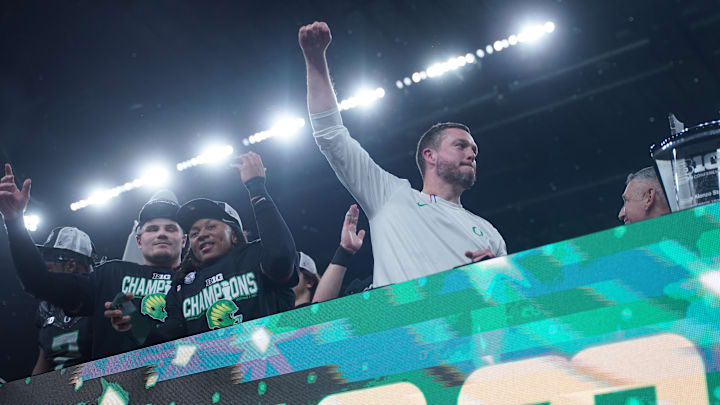 Dec 7, 2024; Indianapolis, IN, USA; Oregon Ducks head coach Dan Lanning celebrates defeating the Penn State Nittany Lions to win the Big Ten Championship in the 2024 Big Ten Championship game at Lucas Oil Stadium