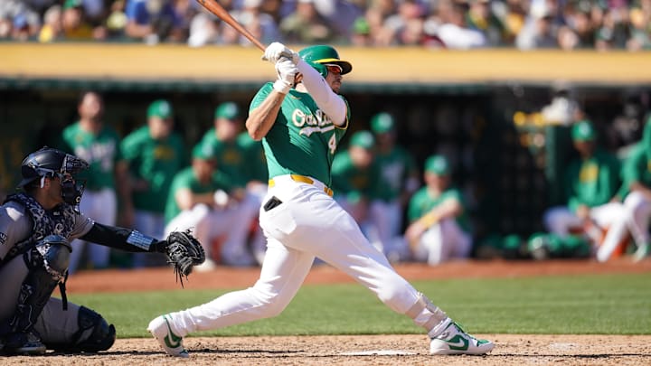 Sep 22, 2024; Oakland, California, USA; Oakland Athletics infielder Ryan Noda hits a two-run double against the New York Yankees in the sixth inning at the Oakland-Alameda County Coliseum. Mandatory Credit: Cary Edmondson-Imagn Images