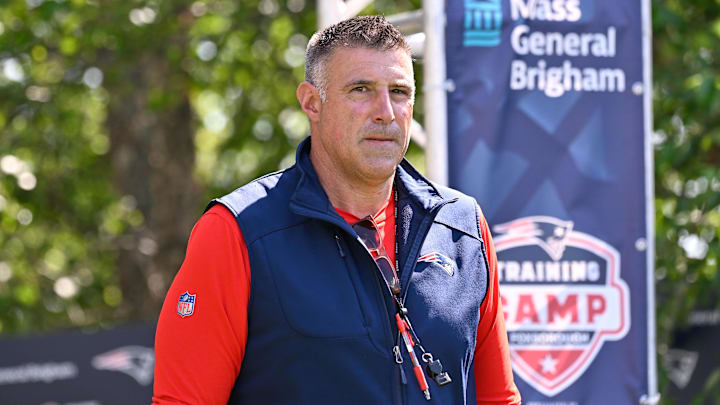 Jul 28, 2025; Foxborough, MA, USA; New England Patriots head coach Mike Vrabel heads to the practice fields for training camp at Gillette Stadium. Mandatory Credit: Eric Canha-Imagn Images