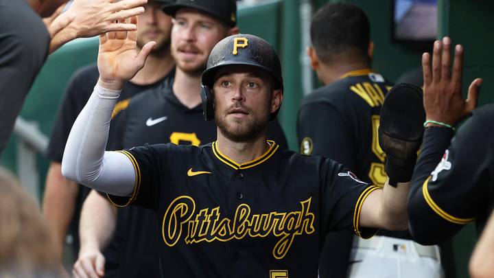 May 26, 2026; Pittsburgh, Pennsylvania, USA;  Pittsburgh Pirates second baseman Brandon Lowe (5) celebrates in the dugout after scoring a run against the Chicago Cubs during the fifth inning at PNC Park. Mandatory Credit: Charles LeClaire-Imagn Images
