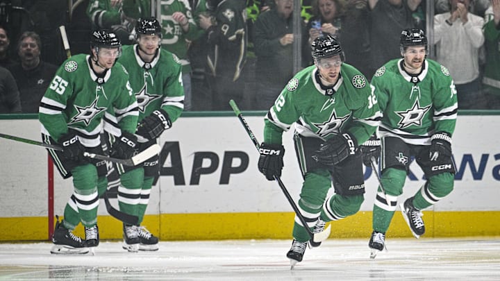 May 5, 2024; Dallas, Texas, USA; Dallas Stars center Radek Faksa (12) and defenseman Miro Heiskanen (4) and defenseman Thomas Harley (55) center Sam Steel (18) skate off the ice after Faksa scores the game winning goal against the Vegas Golden Knights during the third period in game seven of the first round of the 2024 Stanley Cup Playoffs at American Airlines Center. Mandatory Credit: Jerome Miron-Imagn Images