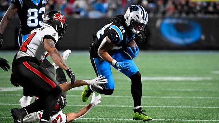 Carolina Panthers running back Jonathon Brooks (24) runs as Tampa Bay Buccaneers cornerback Zyon McCollum (27) defends Carolina Panthers running back Jonathon Brooks (24) runs as Tampa Bay Buccaneers cornerback Zyon McCollum (27) defends