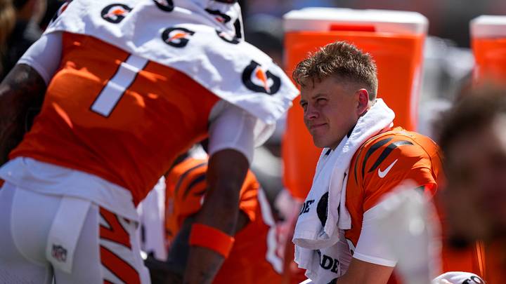 Cincinnati Bengals quarterback Joe Burrow (9) talks with wide receiver Ja'marr Chase (1) between drives in the first quarter of the NFL Week 1 game between the Cincinnati Bengals and the Tampa Bay Buccaneers at Paycor Stadium in Cincinnati on Sunday, Sept. 13, 2026. Cincinnati Bengals quarterback Joe Burrow (9) talks with wide receiver Ja'marr Chase (1) between drives in the first quarter of the NFL Week 1 game between the Cincinnati Bengals and the Tampa Bay Buccaneers at Paycor Stadium in Cincinnati on Sunday, Sept. 13, 2026.